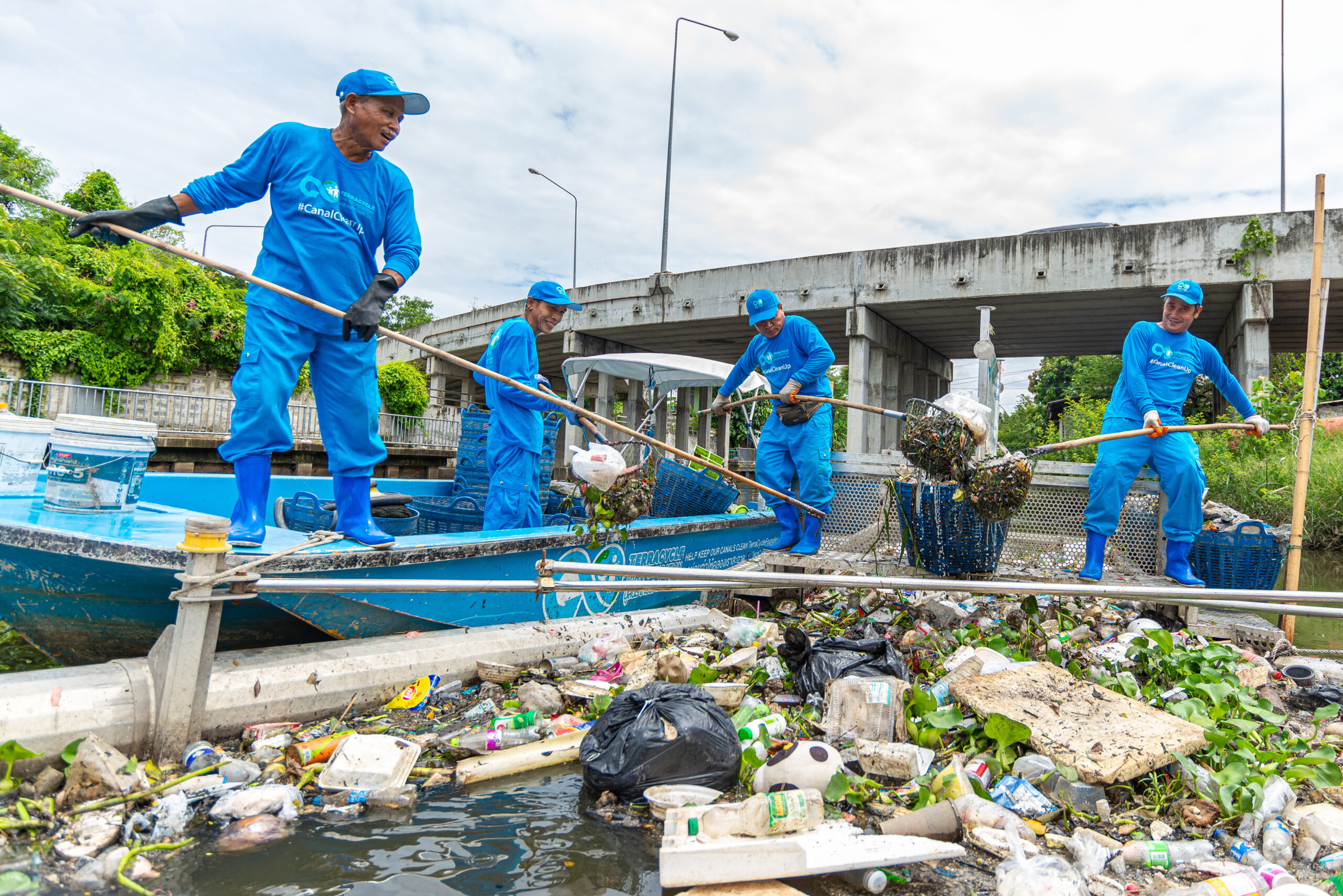 TCGF team cleaning up trash from the river